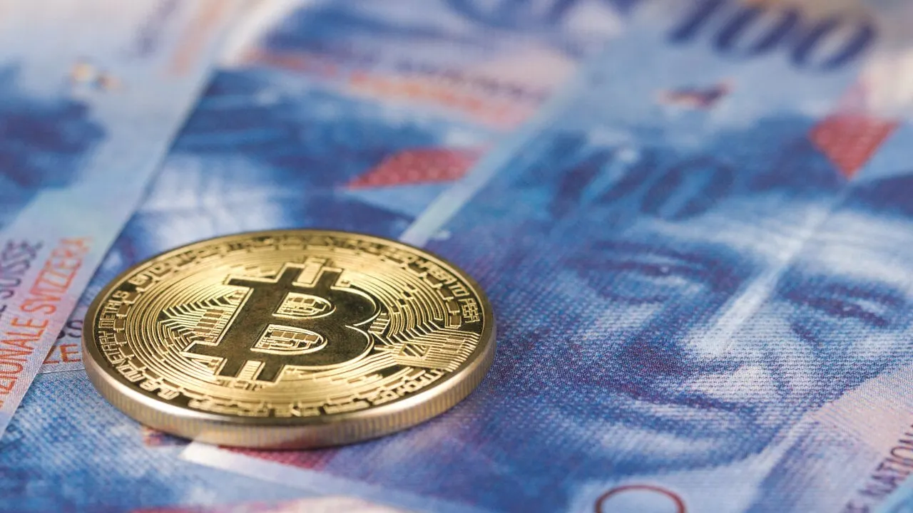 Bitcoin and Swiss francs. Image: Shutterstock